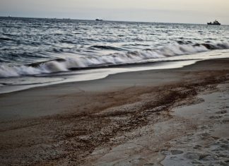 Beach waves oil spill