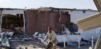 tornado aftermath survivors search devastation bicycle